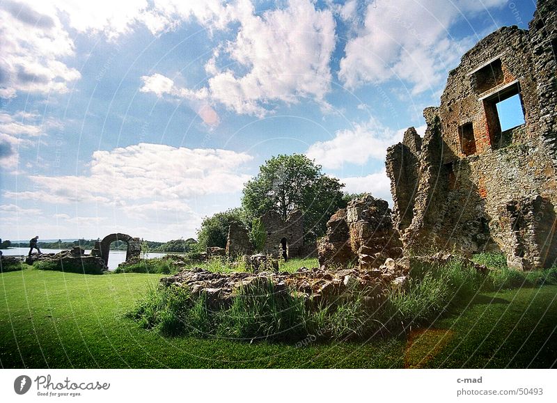 Crom Castle on Lough Erne Northern Ireland Ruin Manmade structures Lake Clouds Park Green Gray Summer River Water Tower castle Construction site