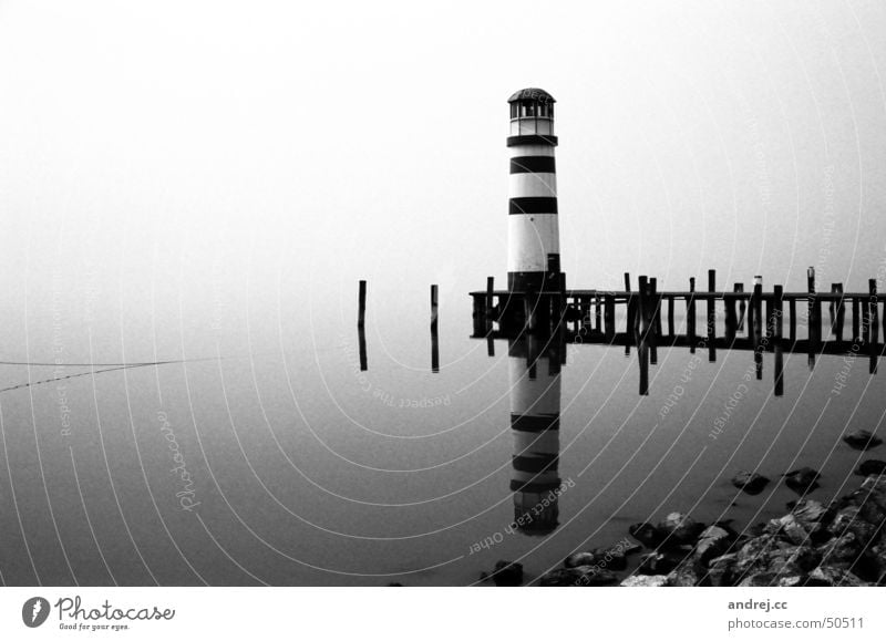 lighthouse Lighthouse Fog Dreary Footbridge Loneliness Reflection Water Gloomy Black & white photo Lake Neusiedl Landscape