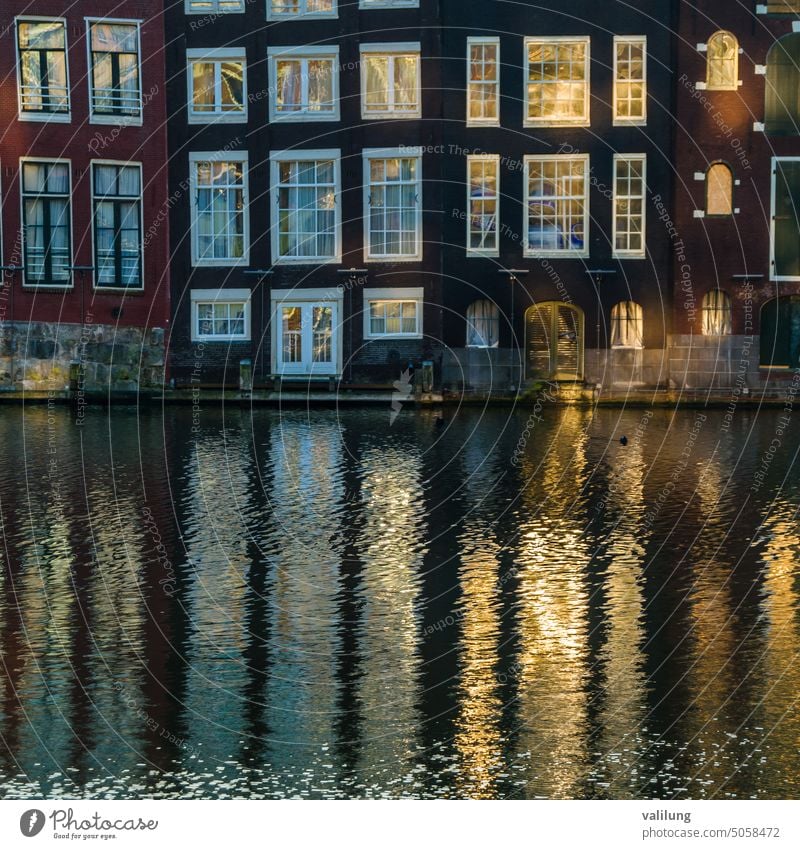Colorful houses along the canal in Amsterdam, the Netherlands Dutch Europe European Holland architecture building city cityscape color colorful