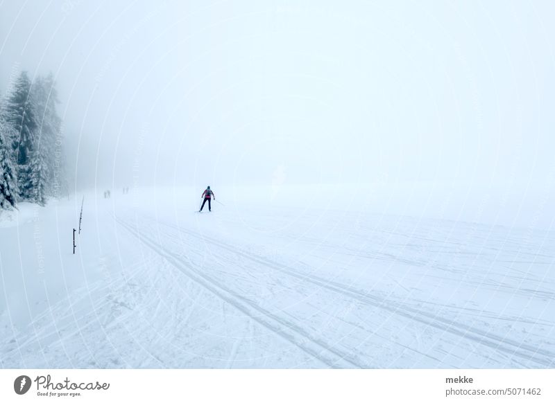 Chairlift in the fog - a Royalty Free Stock Photo from Photocase