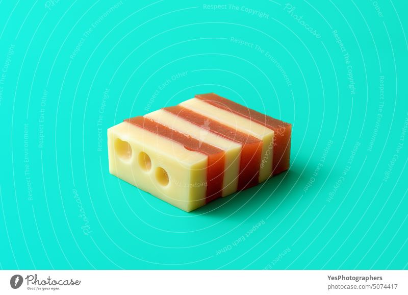 Cheese with quince marmalade snack isolated on a blue background autumn bright brown cheese close-up color confiture copy space cuisine cut out cuts delicious