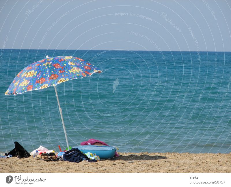 gone for a swim Sunshade Ocean Beach Brown Clothing Luggage Forget Multicoloured Greece Air mattress Blue Sand left Shadow