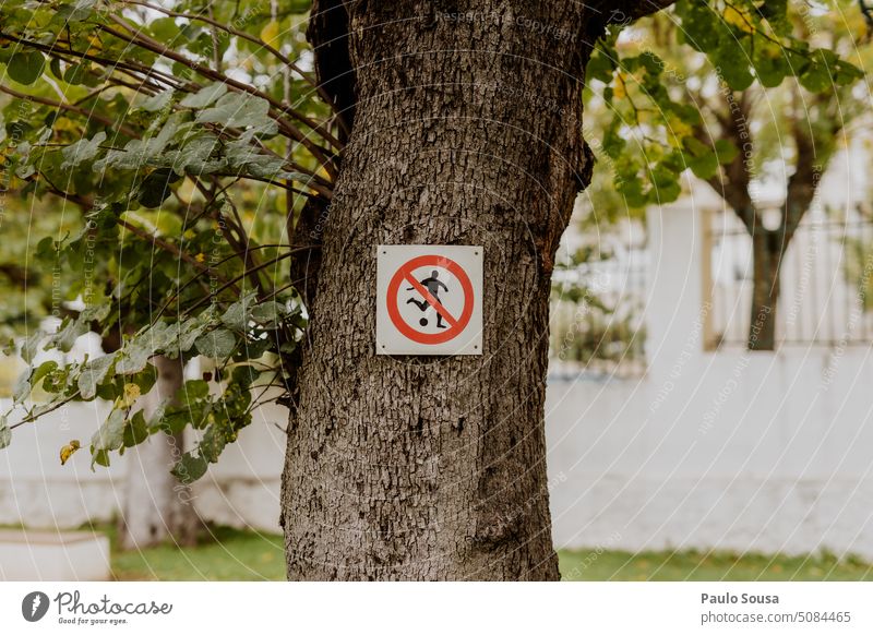 Forbidden to play ball sign forbidden Sign Signs and labeling Park Playground Ball football Safety Warning label Exterior shot Warning sign interdiction