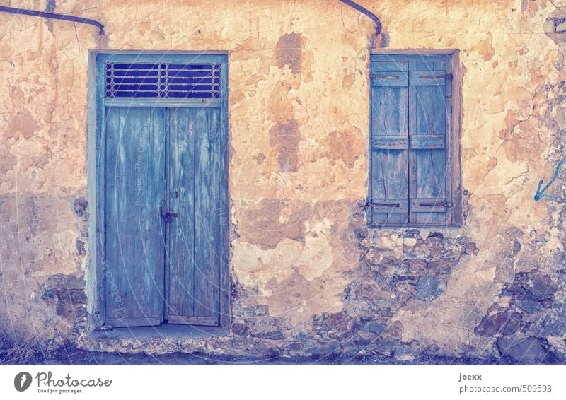 midday heat Hut Wall (barrier) Wall (building) Facade Window Door Old Blue Brown Black Idyll Transience Colour photo Subdued colour Exterior shot Deserted Day