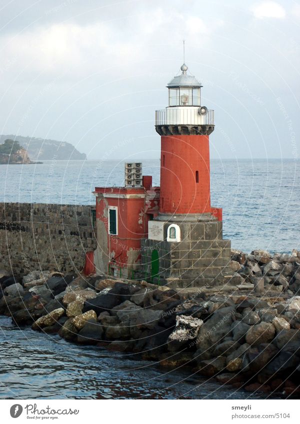 lighthouse Ocean Lighthouse Red Wall (barrier) Jetty Horizon Fisherman Harbour Landmark Monument Water Stone kay Mountain Sky