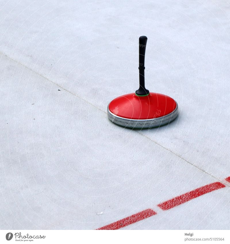 Curling on a synthetic ice rink Ice Cane ice stick shooting contest Artificial ice Artificial ice rink Winter game fun Movement playing surface Exterior shot