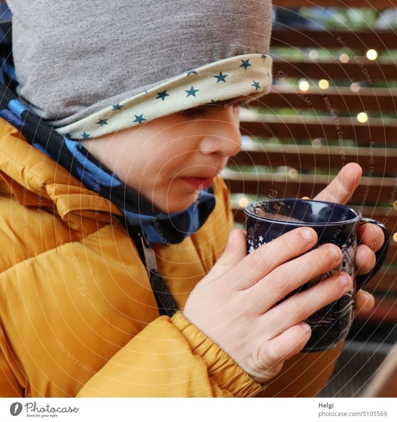 Portrait of boy holding cup with hot chocolate in hands Human being Boy (child) Child portrait Face Cup Hot chocolate Beverage Hot drink warming Winter chill