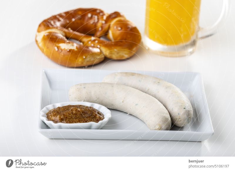 Bavarian white sausages on the plate Veal sausage Meat veal cute Mustard Plate White two Beer glass Tasty Characteristic Snack bar Delicious Hearty Speciality