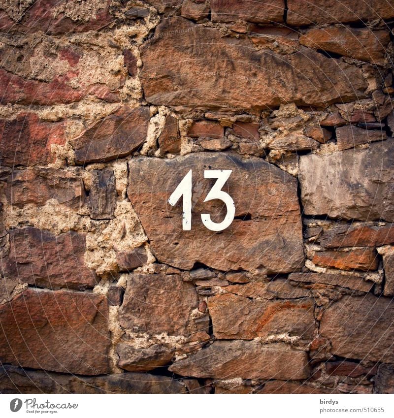 13...so what? Wall (barrier) Wall (building) Stone Sign Digits and numbers Brown Red Popular belief Esthetic Belief Religion and faith Sandstone