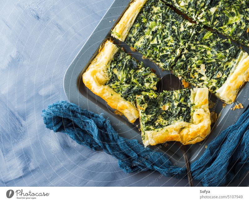 Spinach savory quiche with cream cheese spinach pie green bake food meal dinner lunch roll dough pastry puff herb tray rustic vegetable vegetarian italian crust