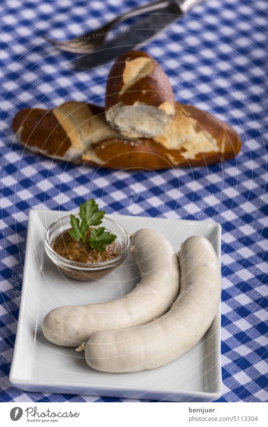 Bavarian white sausages on the plate Veal sausage White Plate rectangular Breakfast Eating veal Munich Oktoberfest Germany Snack bar Wood Party Roadhouse