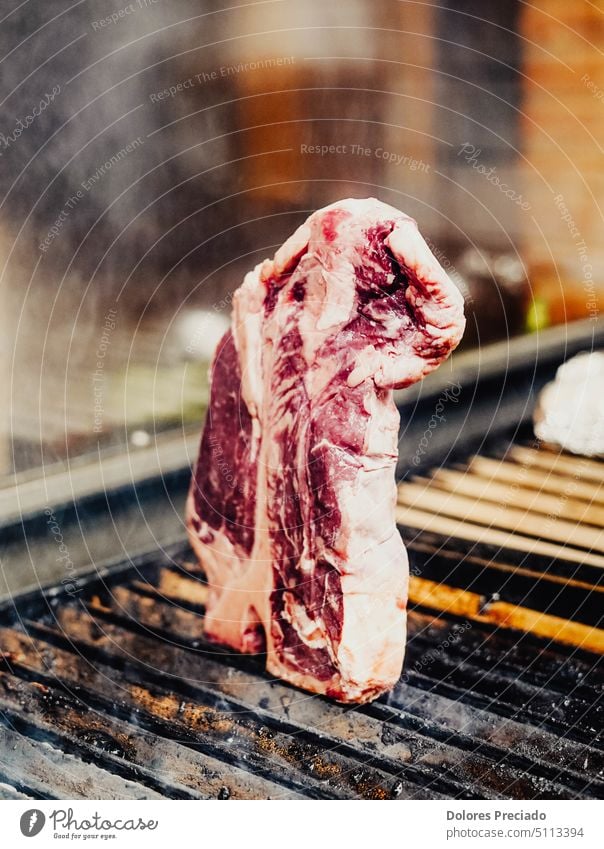 Exquisite cuts of beef in an Argentine steakhouse angus background barbecue bbq beefsteak black bone butcher chop cook cooking delicious dinner eat fillet food