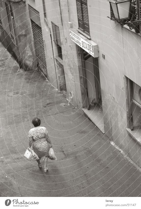Shopping in the alleys of Palma Palma de Majorca Alley Bird's-eye view Loneliness Poverty outside shot with tele lens