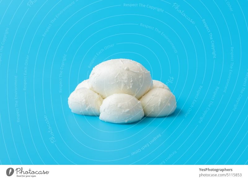 Mozzarella balls isolated on a blue background appetizer breakfast bright bufala buffalo burrata calcium caprese cheese color copy space cuisine cut out dairy