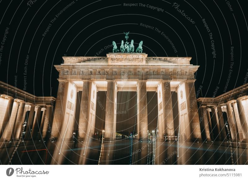 Brandenburg Gate stands on Pariser Platz. Construction is illuminated. Night sky background. berlin building gate germany landmark monument tor architecture
