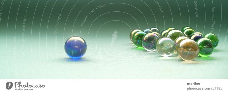 green marbles Playing Children's game Success Work and employment Stone Glass Sphere Movement Round Green Joy Power Might Safety Protection Safety (feeling of)