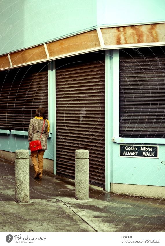 albert walk Human being Feminine Young woman Youth (Young adults) Woman Adults House (Residential Structure) Facade Going Store premises Closed Roller shutter