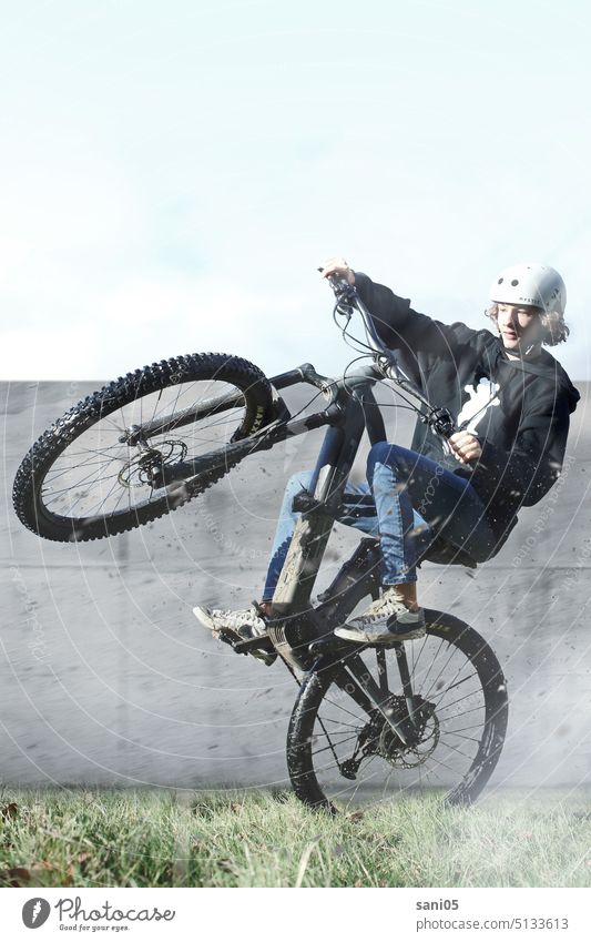 Teenager on mountain bike teenager Boy (child) Bicycle Trick talent training Cool Athletic active Outdoors masculine hobby Capability Street Guy Practice City
