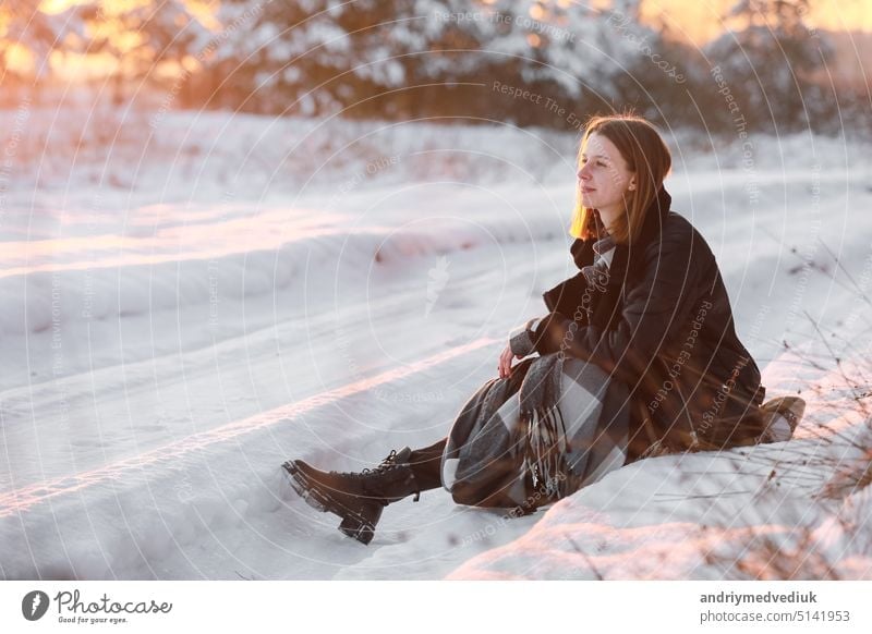 Premium Photo  Young woman with warm clothes in cold winter snow drinking  coffee to go