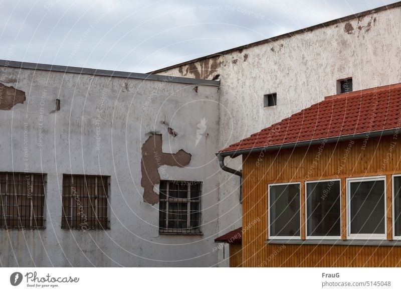 Decay in construction House (Residential Structure) Building angles Window Grating wood panelling brick Roof Eaves Plaster Flake off Old Facade Figure Decline