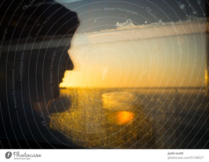 a cold beer in the sunset Man Silhouette Sunset Beer Alcoholic drinks Beer glass Reflection Horizon Pane relaxing Glass Beverage Sunlight Dirty Misted up