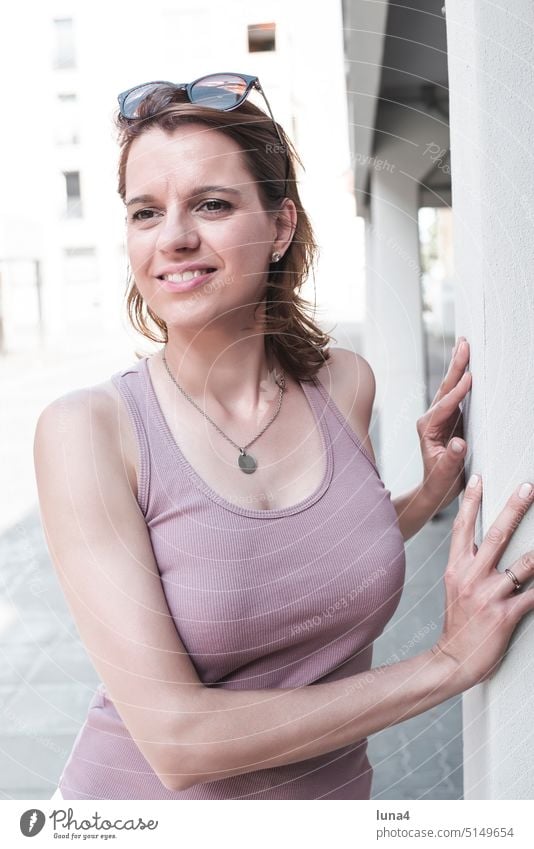 happy young woman in the city Woman cheerful Laughter Young woman portrait relaxed fortunate Happy Single Smiling optimistic confident pleasure millennials Joy