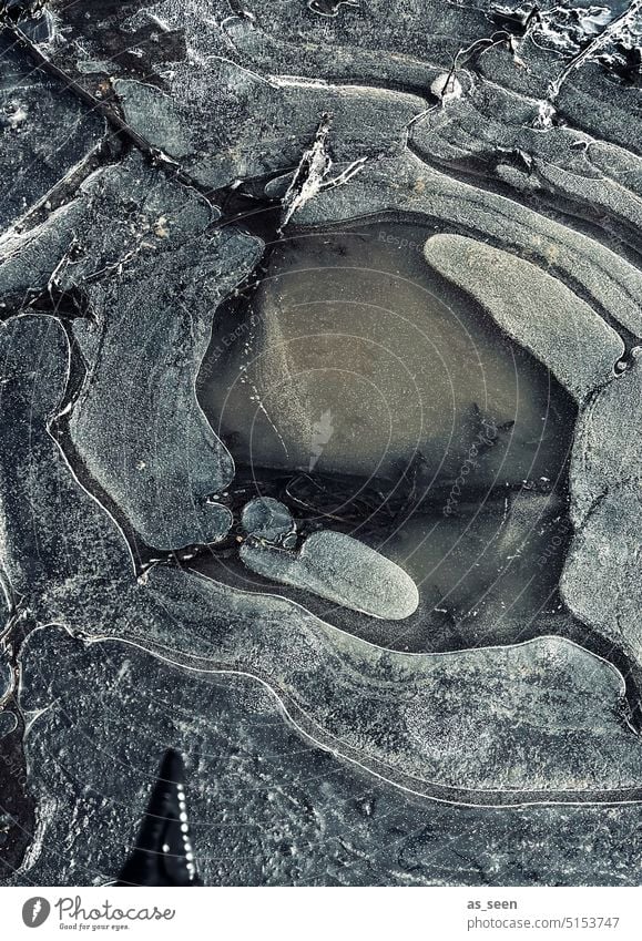 black ice Ice Frost Frozen Puddle ice floes Winter Cold Deserted Exterior shot Water Environment Abstract Structures and shapes Black & white photo Bizarre