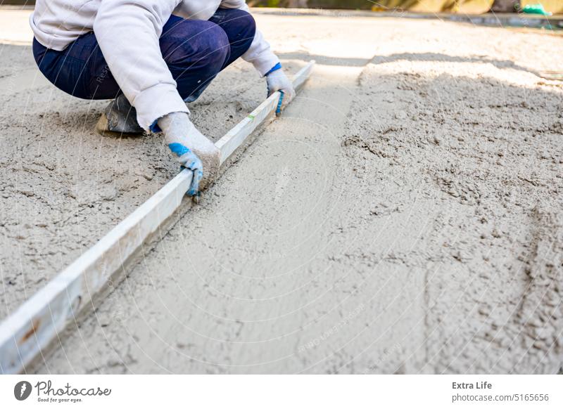 Worker is leveling fresh concrete after pouring Align Base Builder Building Site Cement Civil Engineering Concrete Concreting Construction Equalization