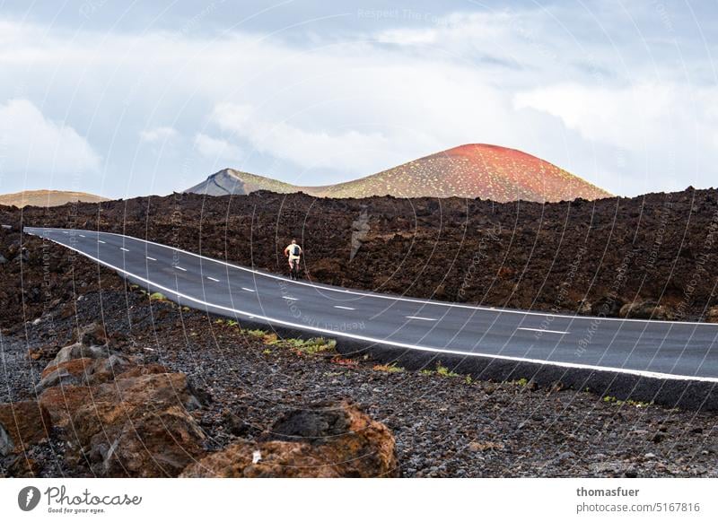 Volcano - road with bike Vacation & Travel Peak Beautiful weather Mountain Far-off places Sky Clouds Horizon Day Light Shadow Panorama (View) Volcanic island