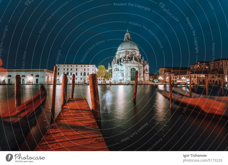 Canal Grande and Basilica di Santa Maria della Salute illuminated at dusk night time. Venice, Italy italy venice canal basilica santa maria salute grande