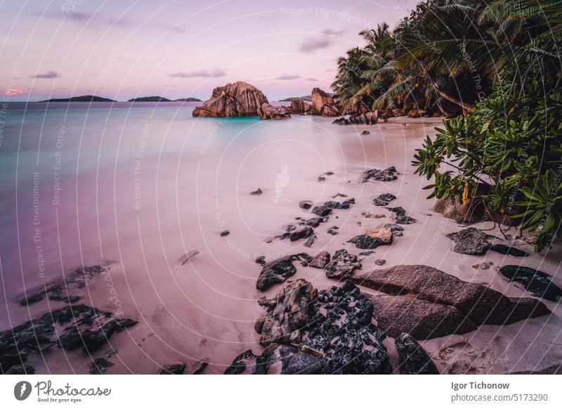 Paradise exotic beach on La Digue Island, Seychelles. Long Exposure during amazing sunset long long exposure light digue island paradise seychelles anse