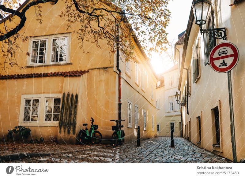 Old european city street with cobblestone in autumn. Cozy exterior. architecture building old prague capital house tourism town cityscape czech landmark travel