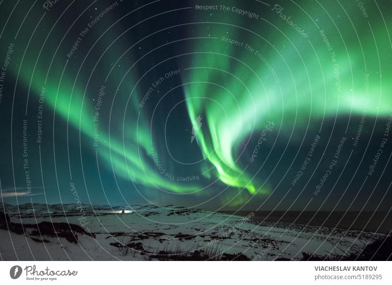 winter northern Aurora, on the shores of the Barents Sea Aurora Borealis Winter Starry sky Stars