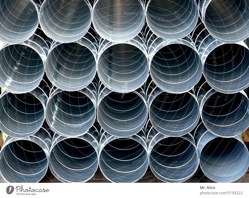 Spiral duct DN 100 Pipe Stack Round Arrangement Identical Home improvement store quantity Consecutively Equal Structures and shapes Industrial reeds Industry
