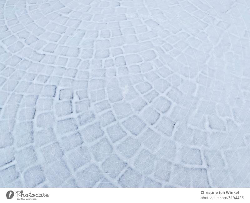 The joints between the lightly snowed paving stones are still clearly visible snowy cobbles Winter Structures and shapes texture Pattern Snow Background picture