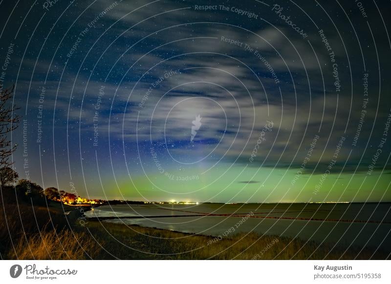 Northern aurora over Sylt northern lights luminous phenomenon skylights aurora borealis Aurora Borealis Nitrogen atoms Solar wind particles Oxygen atoms