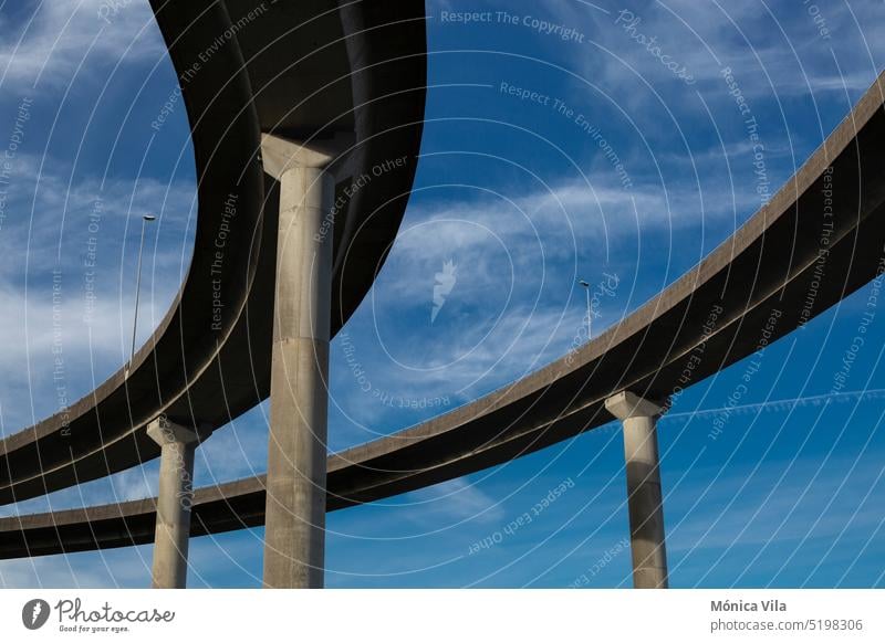 Double viaduct of a highway and blue sky. View of the viaduct of the AP9 motorway in Teis, Vigo. pontevedra road Pontevedra column Column Highway Bridge