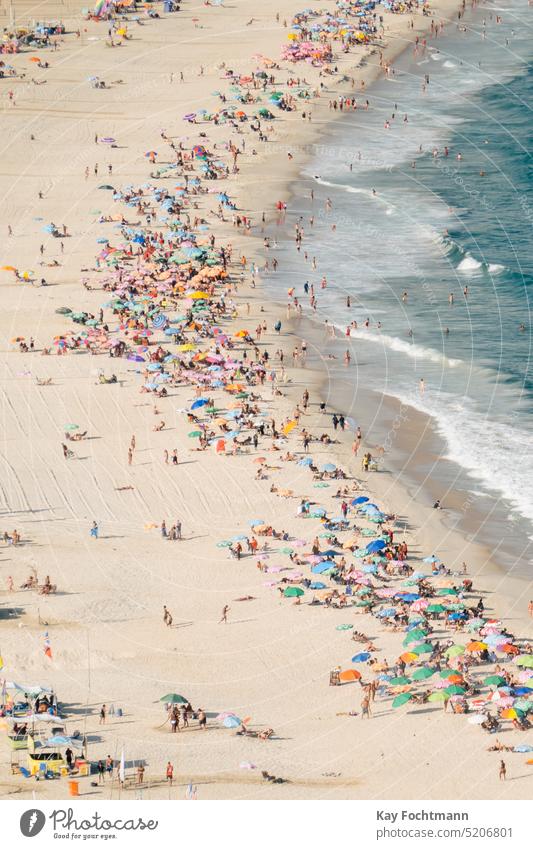 Tourists at Copacabana beach in Rio de Janeiro vibrations Summer Turquoise aqua seashore Shore line scenic performances crowded beach Waves blue-green coastline