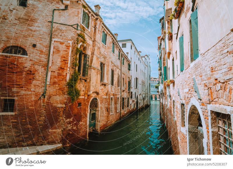 Venice, Italy. View of the Rio de Garzoni Canal and brick wall of ancient building italy venice view piazza sky skyline tourism traditional travel urban