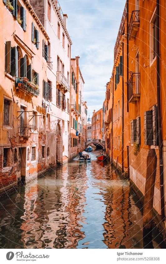 Venice, Italy. Beautiful view of the typical channels canals in Venezia. With small boat and Gondolas transportation venezia italy venice beautiful tourism