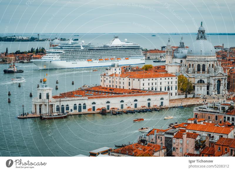 Venetian aerial cityscape view of Basilica Santa Maria della Salute from San Marco Campanile. Venice, Italy. Cruise ship floating in lagoon venetian italy