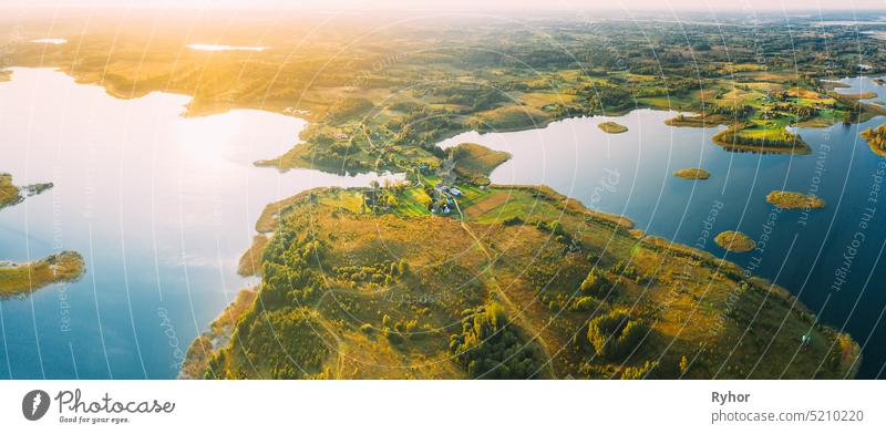 Braslaw Or Braslau, Vitebsk Voblast, Belarus. Aerial View Of Peninsula Maskovichi Nedrava Lake. Forest Landscape In Sunny Autumn Morning. Top View Of Beautiful European Nature From High Attitude. Bird's Eye View. Panorama. Famous Lakes. Natural Landmarks