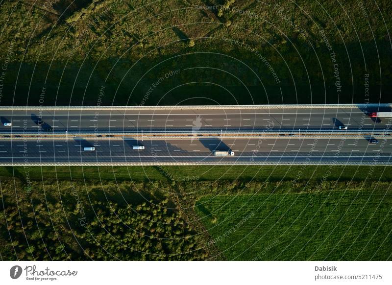Cars driving on highway road near forest trees, top view traffic car transportation green landscape overhead countryside above aerial asphalt auto automobile