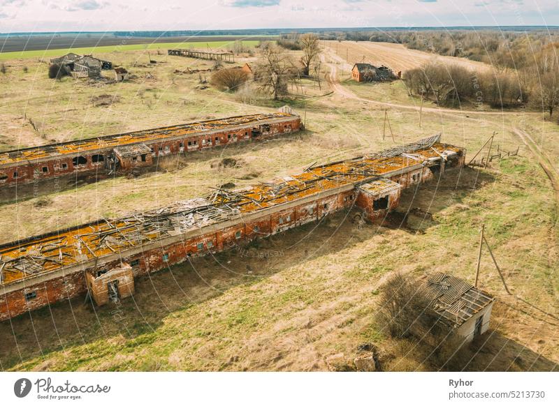 Belarus. Abandoned Barn, Shed, Cowsheds, Farm House In Chernobyl Resettlement Zone. Chornobyl Catastrophe Disasters. Dilapidated House In Belarusian Village. Whole Villages Must Be Disposed