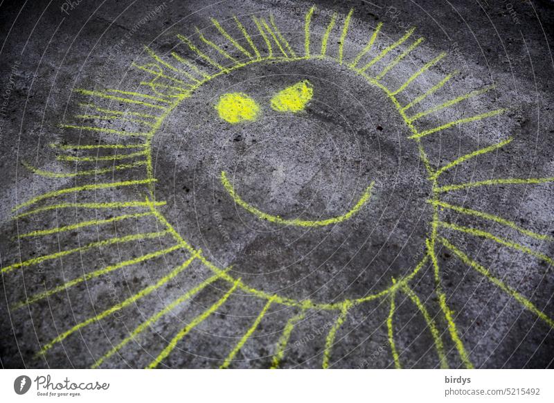 friendly ,yellow sun on gray asphalt Sun chalk painting childhood photograph Floor picture Street painting Infancy Sunbeam Face Playing
