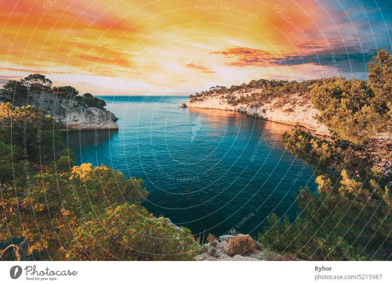 Cassis, Calanques, France. French Riviera. Beautiful Nature Of Cote De Azur On The Azure Coast Of France. Calanques - A Deep Bay Surrounded By High Cliffs. Altered Sunset Sky. Elevated View
