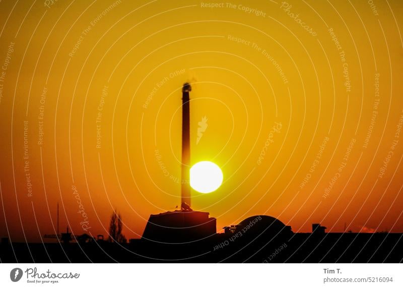 Chimney with setting sun in Berlin Sun Prenzlauer Berg Sunset Town Deserted Downtown Exterior shot Capital city Colour photo Old town Day