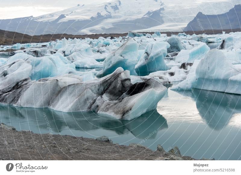 Blue glacier in Jökulsárlón Iceland copy space no people arctic beautiful beauty blue clouds cold environ environment environmental environmental protection