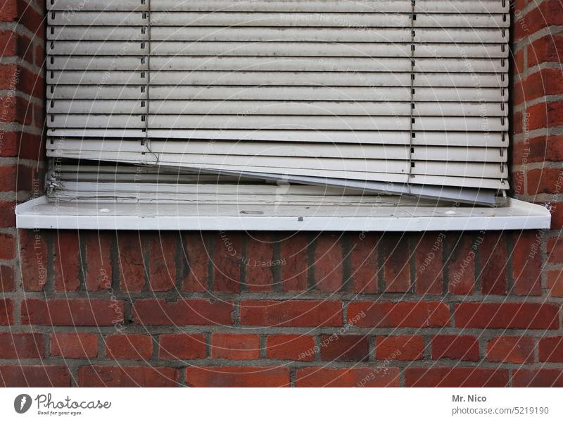 it is stuck Window Roller blind Venetian blinds Closed Roller shutter Gloomy Screening obliquely Facade Inclined position broken battered Weather protection