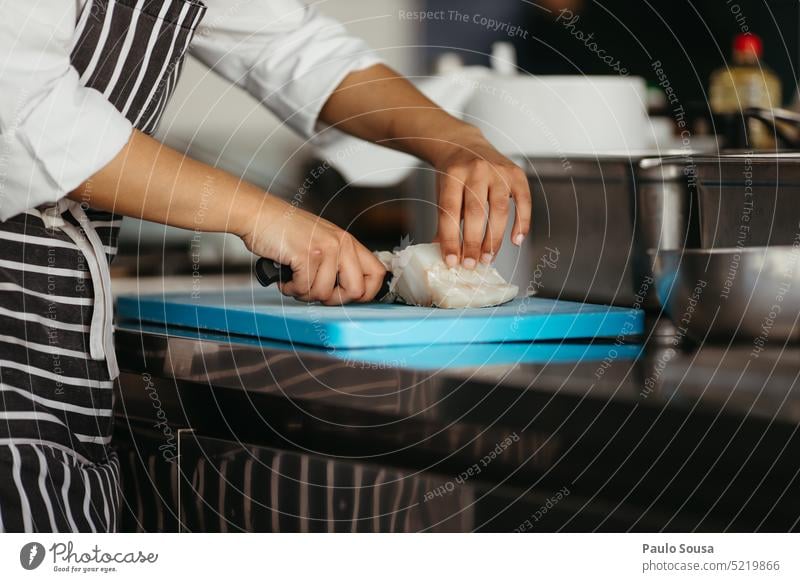 Close hands cutting fish Cooking chef Kitchen cooking Restaurant Human being food Colour photo Hold Caucasian occupation Profession Hand Uniform Professional